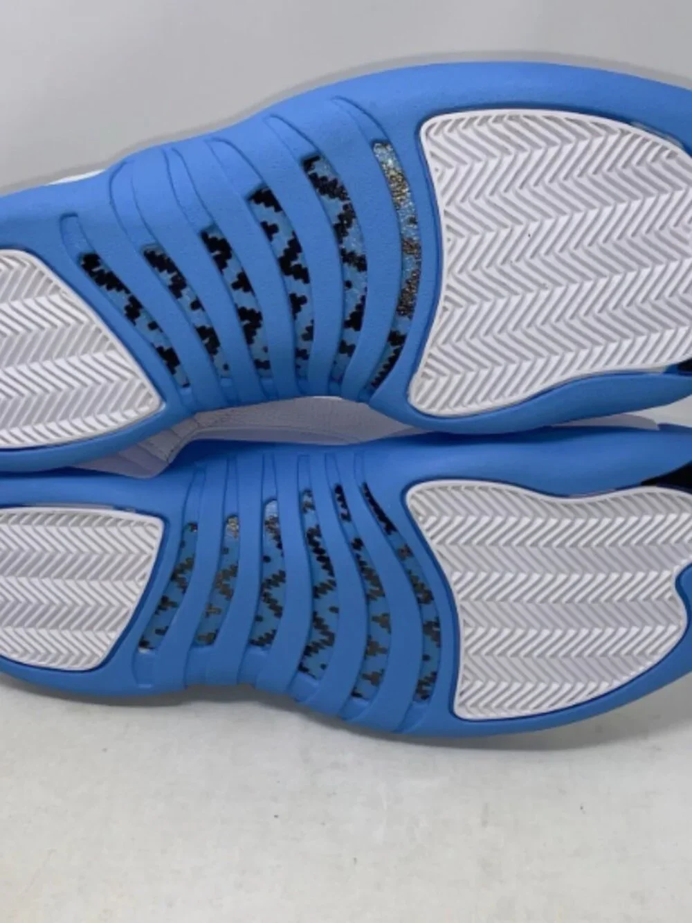 Air Jordan 12 'Melo UNC University Blue' White Sneakers